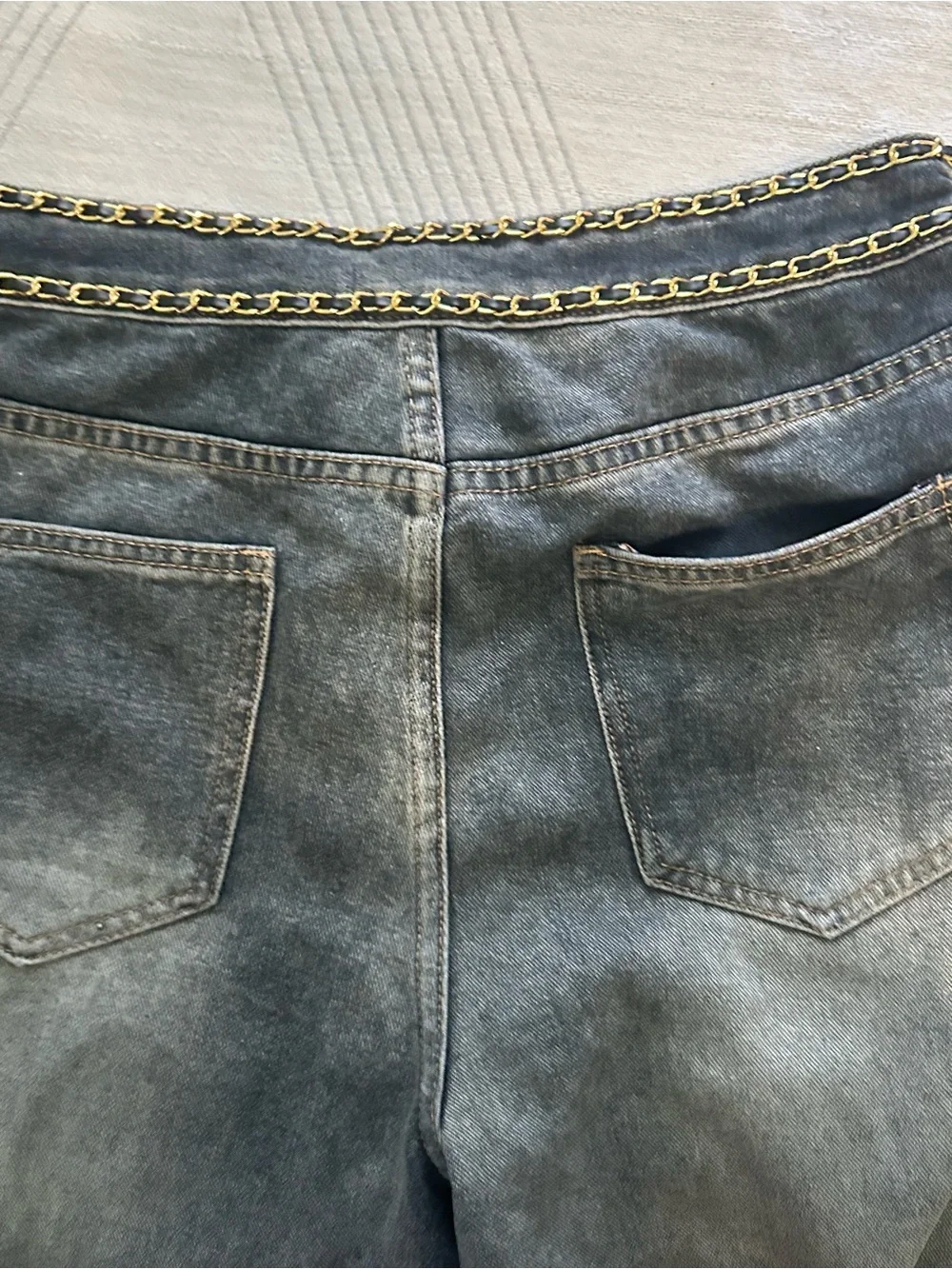 CHANEL Dark Blue Denim Jeans with Gold Chain Trim
